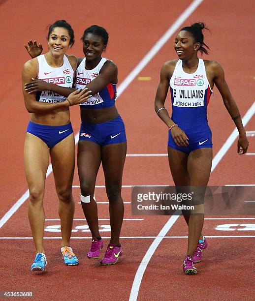 Silver medalist Jodie Williams of Great Britain and Northern Ireland is congratulated by Dina Asher-Smith of Great Britain and Northern Ireland and...