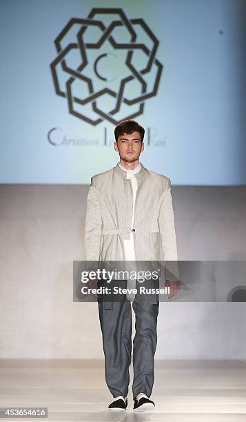 Models wearing Christian L'Enfant Roi walk the Concert Hall runway for TOM*, Toronto Men's Fashion Week at Royal York Hotel in Toronto. August 12,...