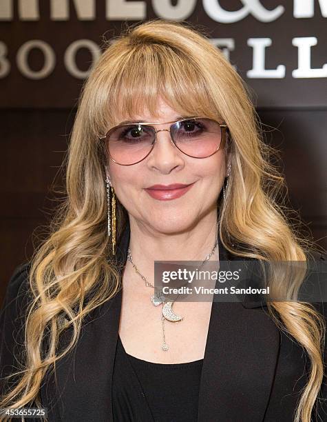 Singer Stevie Nicks signs her documentary "In Your Dreams" at Barnes & Noble bookstore at The Grove on December 4, 2013 in Los Angeles, California.
