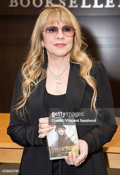 Singer Stevie Nicks signs her documentary "In Your Dreams" at Barnes & Noble bookstore at The Grove on December 4, 2013 in Los Angeles, California.