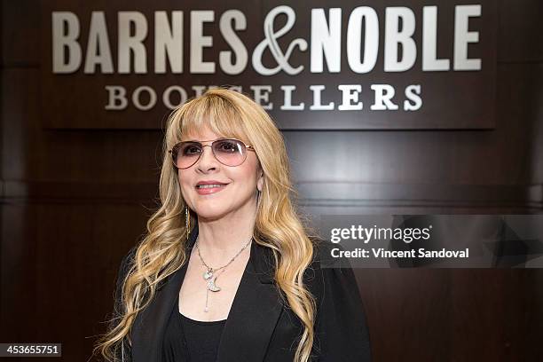 Singer Stevie Nicks signs her documentary "In Your Dreams" at Barnes & Noble bookstore at The Grove on December 4, 2013 in Los Angeles, California.