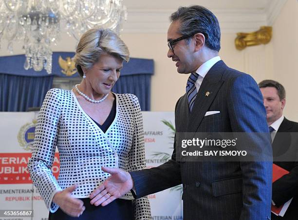 Indonesia and Australia foreign ministers, Marty Natalegawa and Julie Bishop shake hands before their meeting in Jakarta on December 5, 2013. Bishop...
