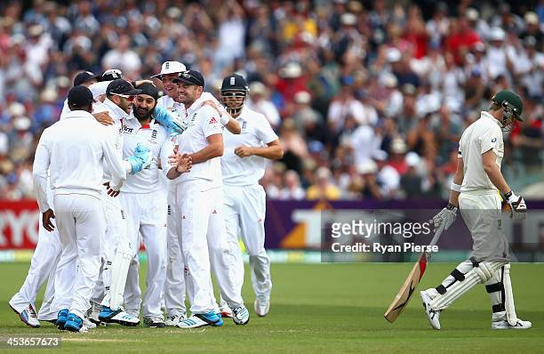 Monty Panesar of England celebrates after taking the wicket of Steve Smith of Australia during day one of the Second Ashes Test Match between...