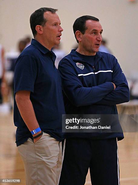 Head coach Mike Krzyzewski of the USA Basketball National team , talks with head coach Chris Collins of Northwestern University during a USA...