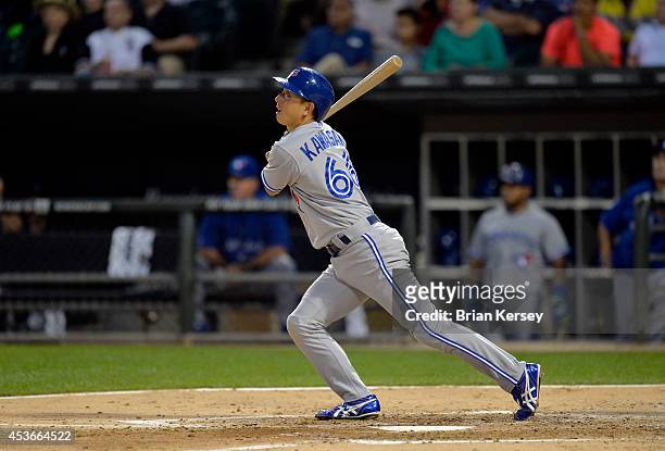 Munenori Kawasaki of the Toronto Blue Jays singles during the second inning against the Chicago White Sox at U.S. Cellular Field on August 15, 2014...