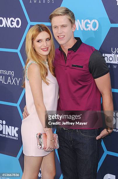 Actors Bella Thorne and Tristan Klier arrive at the 16th Annual Young Hollywood Awards at The Wiltern on July 27, 2014 in Los Angeles, California.
