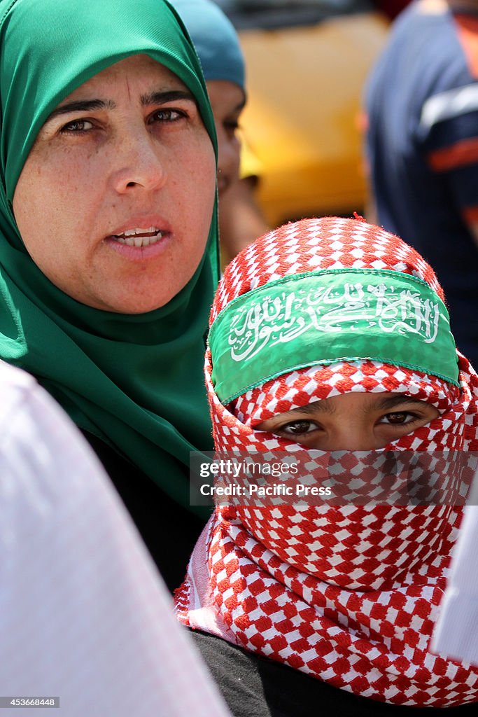 A Palestinian boy, who is a supporter of the Islamic...