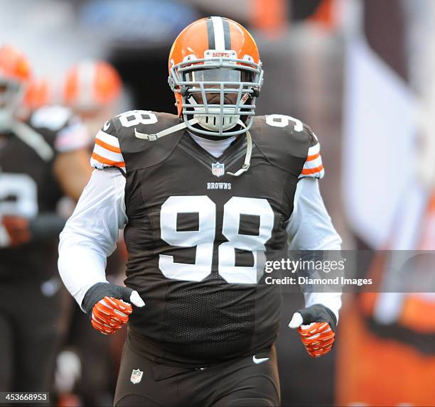 Defensive linemen Phil Taylor of the Cleveland Browns runs onto the field during pre game introductions before a game against the Pittsburgh Steelers...