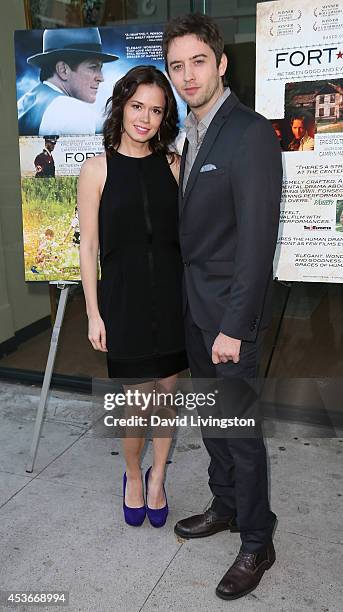 Actors Christie Burson and Johnny Pacar attend the premiere of "Fort McCoy" at Laemmle's Music Hall 3 on August 15, 2014 in Beverly Hills, California.