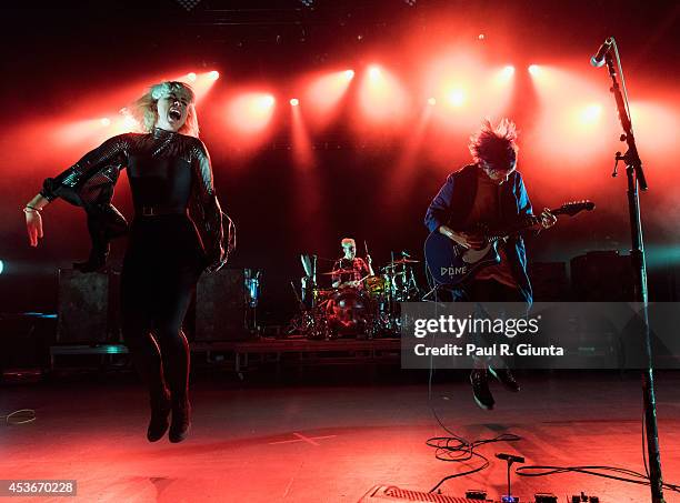 Hannah Hooper and Christian Zucconi of Grouplove perform onstage at The Greek Theatre on August 15, 2014 in Los Angeles, California.