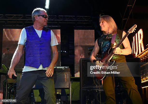 Singer Ian Gillan and guitarist Steve Morse of Deep Purple perform at the Fremont Street Experience on August 15, 2014 in Las Vegas Nevada.