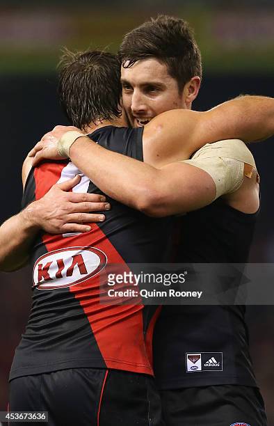 Jobe Watson and David Meyers of the Bombers celebrate winning the round 21 AFL match between the Essendon Bombers and the West Coast Eagles at Etihad...
