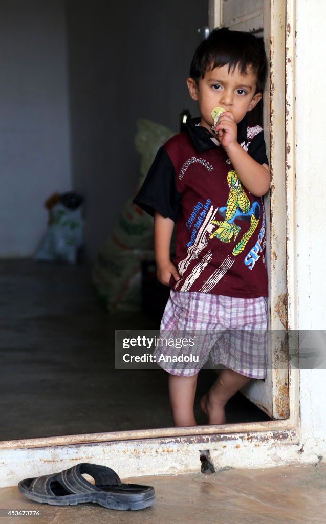 Iraqis fleeing from IS assaults take shelter in Turkey
