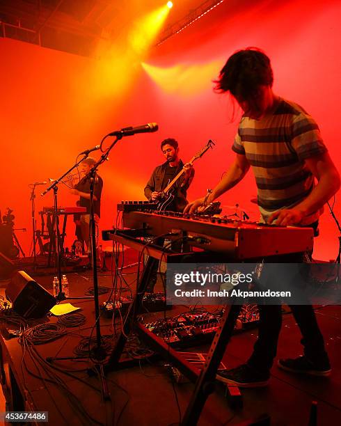 Musicians Kelly Pratt, Peter Silberman, and Darby Cicci of The Antlers perform onstage during Pandora Presents The Antlers at StubHub's Next Stage at...