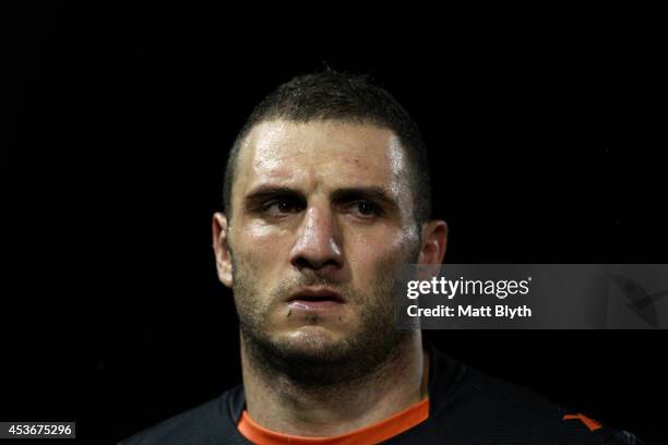 Robbie Farah of the Tigers looks dejected during the round 23 NRL match between the Wests Tigers and the Sydney Roosters at Leichhardt Oval on August...