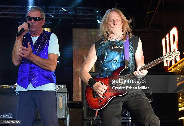 Singer Ian Gillan and guitarist Steve Morse of Deep Purple perform at the Fremont Street Experience on August 15, 2014 in Las Vegas Nevada.