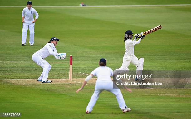 Mithali Raj of India hits a boundary as she leads her team to victory during Day Four of the Womens Test match between England and India at Wormsley...