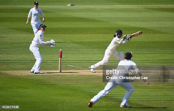 Mithali Raj of India in action as Sarah Taylor and Lydia Greenway of England field during Day Four of the Womens Test match between England and India...