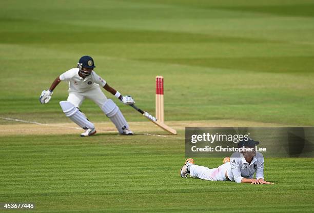 Natalie Sciver of England looks dejected as she lays on the field after a shot by Shikha Pandey of India races past her during Day Four of the Womens...