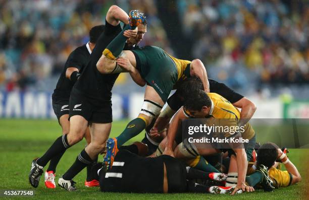 Ben Smith of the All Blacks lifts Scott Fardy of the Wallabies off the ball during The Rugby Championship match between the Australian Wallabies and...