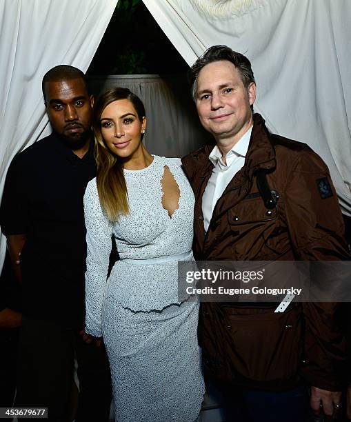 Kanye West, Kim Kardashian, and Jason Binn attend DuJour Magazine's event to honor artist Marc Quinn at Delano South Beach Club on December 4, 2013...