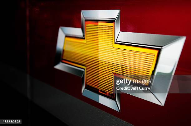 Chevrolet logo is seen in the garage area during practice for the NASCAR Sprint Cup Series Pure Michigan 400 at Michigan International Speedway on...