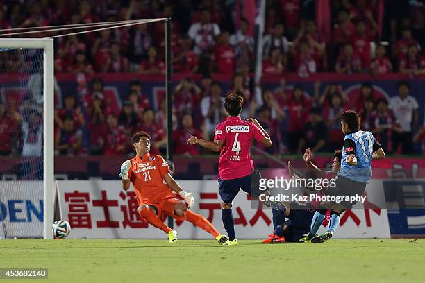 Yu Kobayashi of Kawasaki Frontale scores his team's first goal during the J.League match between Kawasaki Frontale and Cerezo Osaka at Todoroki...