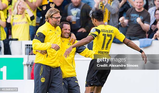 Pierre-Emerick Aubameyang of Dortmund celebrates with his team-mates after scoring his team's second goal of Dortmund with Head coach Juergen Klopp,...