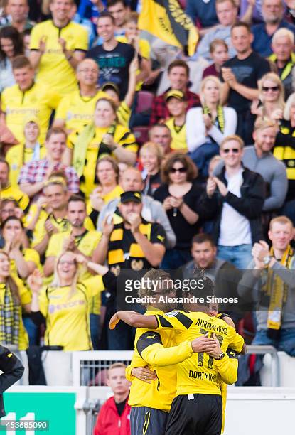 Pierre-Emerick Aubameyang of Dortmund celebrates with his team-mates after scoring his team's second goal of Dortmund with Head coach Juergen Klopp,...