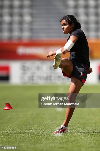 Magali Harvey kicks during the Canada Captain's Run for the IRB Women's Rugby World Cup 2014 at Stade Jean Bouin on August 16, 2014 in Paris, France.