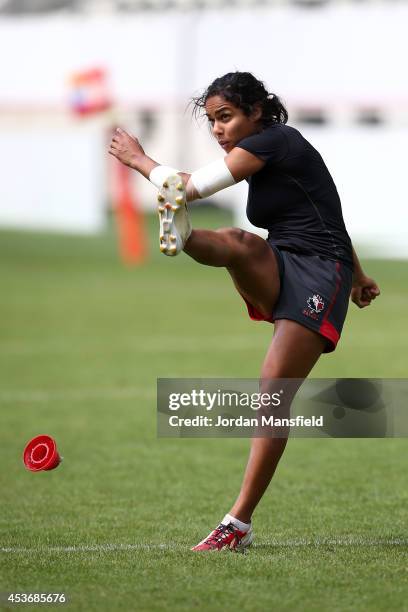 Magali Harvey kicks during the Canada Captain's Run for the IRB Women's Rugby World Cup 2014 at Stade Jean Bouin on August 16, 2014 in Paris, France.