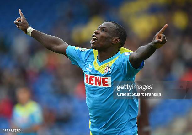Anthony Ujah of Cologne celebrates scoring his second goal during the DFB Pokal match between FT Braunschweig and 1. FC Koeln on August 16, 2014 in...