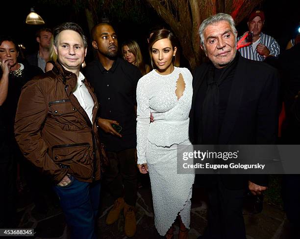 Jason Binn, Kanye West, Kim Kardashian, and designer Roberto Cavalli attend DuJour Magazine's event to honor artist Marc Quinn at Delano South Beach...