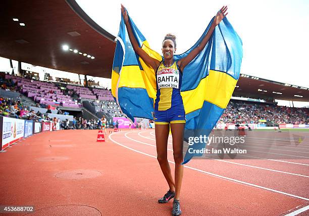 Meraf Bahta of Sweden celebrates winning gold in the Women's 5000 metres final during day five of the 22nd European Athletics Championships at...