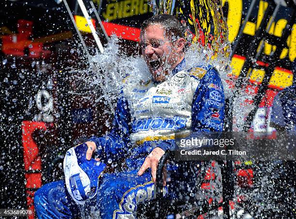 Brian Vickers, driver of the Aaron's Dream Machine Toyota, participates in the ALS Ice Bucket Challenge after practice for the NASCAR Sprint Cup...