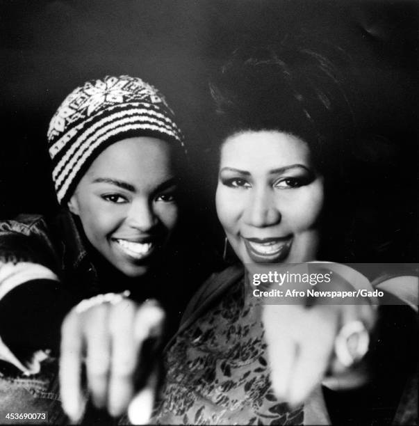 African American singers Lauryn Hill and Aretha Franklin, January 21, 1998.