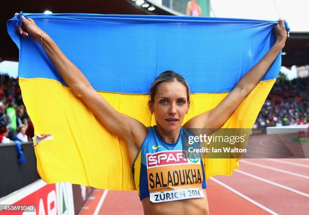 Olha Saladukha of Ukraine celebrates as she wins gold in the Women's Triple Jump final during day five of the 22nd European Athletics Championships...