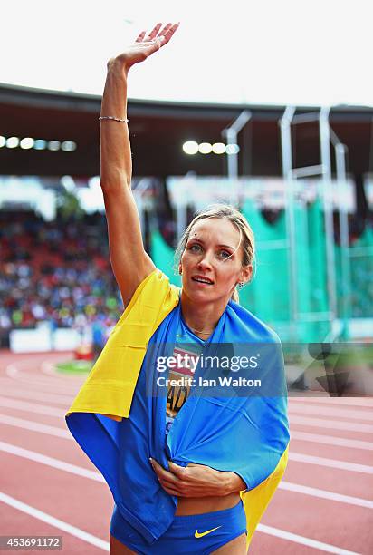 Olha Saladukha of Ukraine celebrates as she wins gold in the Women's Triple Jump final during day five of the 22nd European Athletics Championships...