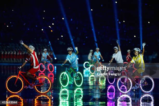 Dancers perform during the opening ceremony for the Nanjing 2014 Summer Youth Olympic Games at the Nanjing Olympic Sports Centre on August 16, 2014...