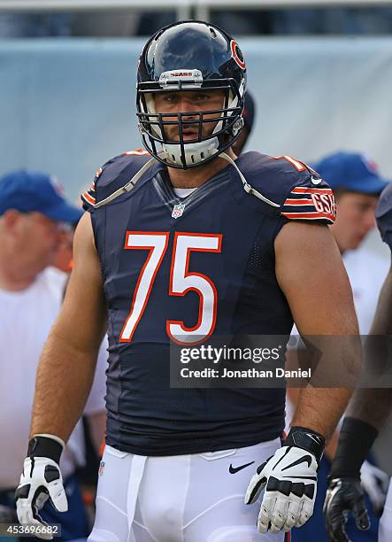 Kyle Long of the Chicago Bears warms up prior to a preseason game against the Jacksonville Jaguars at Soldier Field on August 14, 2014 in Chicago,...