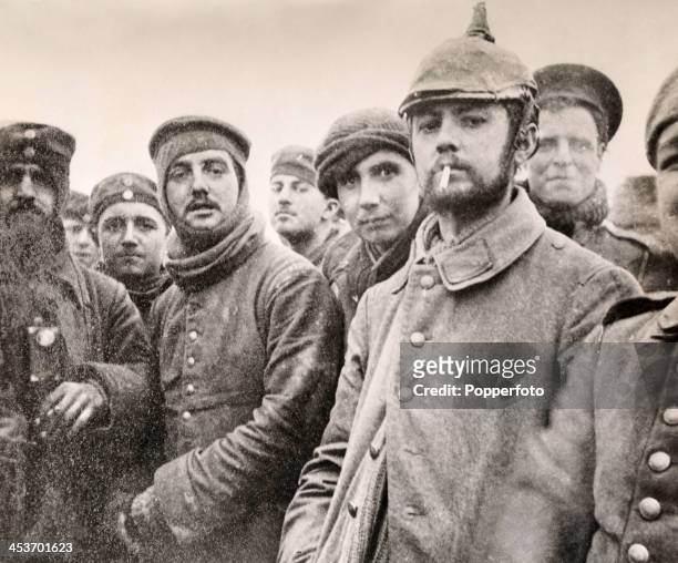 Soldiers of the 5th London Rifle Brigade with German Saxon regimental troops at Ploegsteert Wood during the Christmas Truce of World War One,...