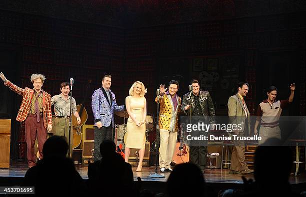 Holly Madison poses for photos with The Million Dollar Quartet cast members Marc D. Donovan, Felice Garcia, Mikey Hachey, Martin Kaye, Justin...