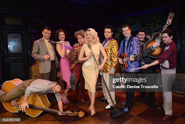 Holly Madison poses for photos with The Million Dollar Quartet cast members Mikey Hachey, Marc D. Donovan, Felice Garcia, Martin Kaye, Justin...