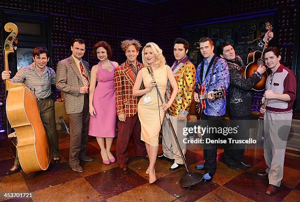 Holly Madison poses for photos with The Million Dollar Quartet cast members Mikey Hachey, Marc D. Donovan, Felice Garcia, Martin Kaye, Justin...