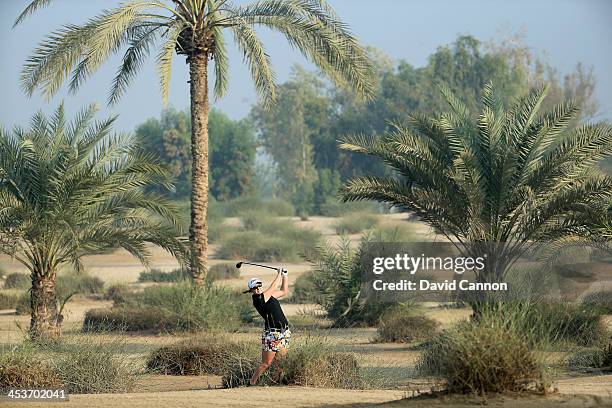 Amelia Lewis of the USA plays her third shot on the par 5, 10th hole during the second round of the 2013 Omega Dubai Ladies Masters on the Majilis...