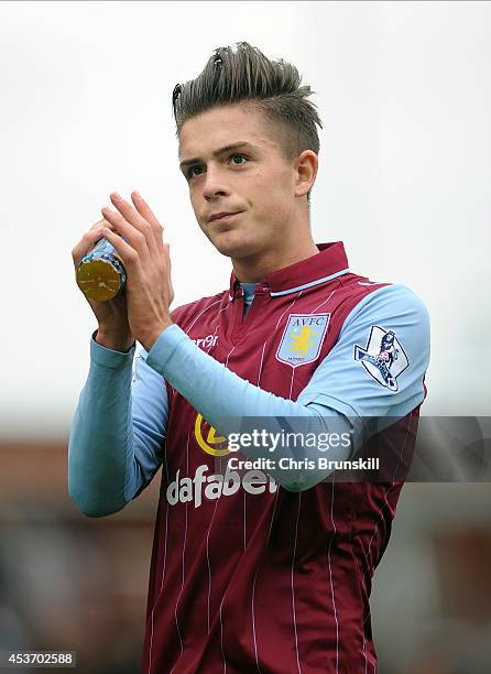 Jack Grealish of Aston Villa applauds the supporters following the Barclays Premier League match between Stoke City and Aston Villa on August 16,...