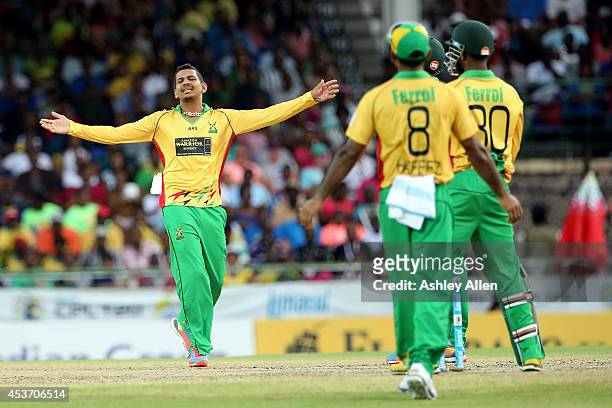 Sunil Narine of Guyana Amazon Warriors reacts to a missed chance during the Limacol Caribbean Premier League 2014 final match between Guyana Amazon...