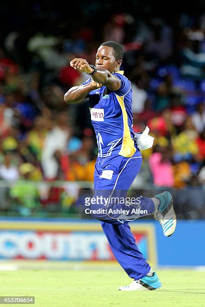 Kyle Mayers of the Barbados Tridents celebrates during the Limacol Caribbean Premier League 2014 final match between Guyana Amazon Warriors and...