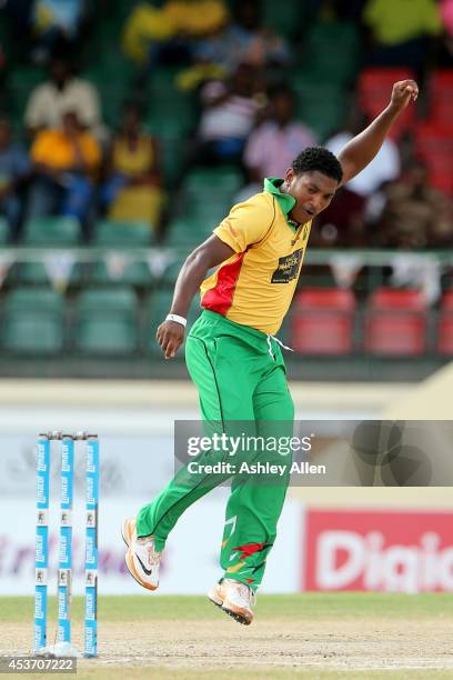 Krishmar Santokie celebrates the wicket of Jason Holder during the Limacol Caribbean Premier League 2014 final match between Guyana Amazon Warriors...