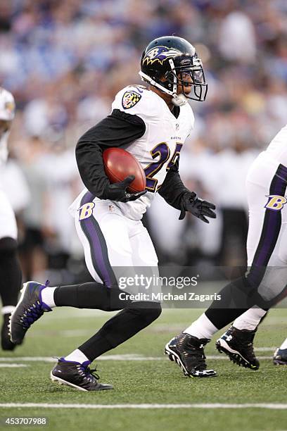 Asa Jackson of the Baltimore Ravens returns a kickoff during the game against the San Francisco 49ers at M&T Bank Stadium on August 7, 2014 in...
